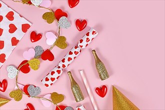 Party flat lay with heart garland