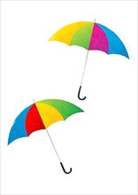 Watercolor umbrellas in rainbow colors over white background