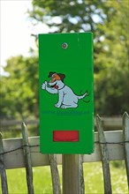 Dog waste bag dispenser