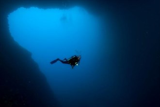 Diver in cave entrance