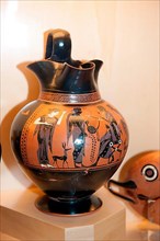 Antique vase with black figures