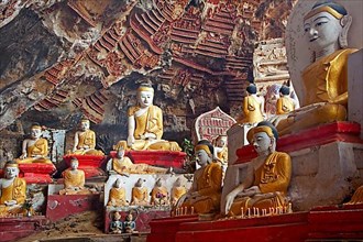 Buddha statues in Kawgun Cave