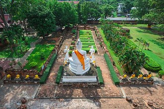 View over the gardens of Wat Yai Chai Mongkhon from the top of the stupa