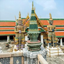 Statues of two ghosts guarding Wat Phra Kaeo complex