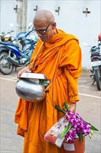 Monk eating