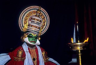 Pacha Green noble and the divine character Performs the mudra elephant in Kathakali