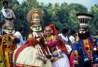 Kathakali dancers in Aranmula boat race procession during Onam Celebrations