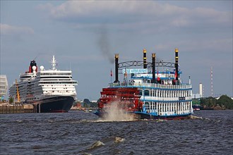 Paddle steamer Louisiana Star and cruise ship Queen Elizabeth