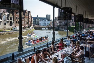 Tourists on the terrace of the Brasserie of the Oude Vismijn
