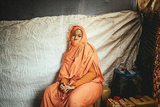 Portrait of a young woman in a traditional tent in Nouamghar