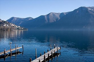 Morning mist at Lake Lugano in Switzerland