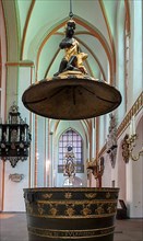 Baptismal font in the main Protestant church of St. Johannis