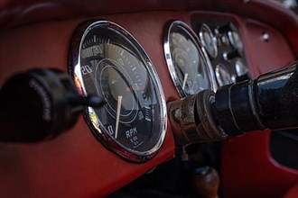 Red speedometer of a classic car