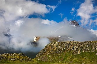 The Alfaborg with the mountain Bakkafjall partly in the clouds