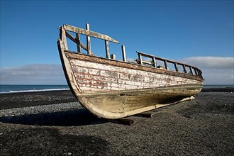 Shipwreck on the black beach
