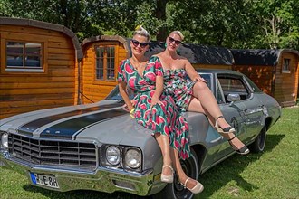American vintage Buick with two woman