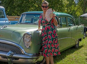 American vintage Buick with a woman