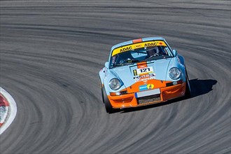 Historic racing car Porsche 911 RSR at car racing for classic cars youngtimer classic cars 24-hour race 24h race