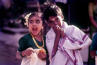 Children in traditional attire during Onam celebrations in Kerala