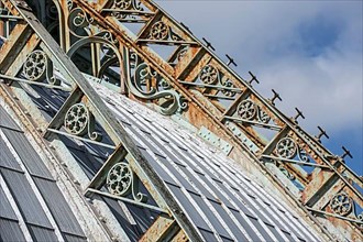 Detail of the ornate wrought-iron roof truss of the Royal Greenhouses of Laeken in Art Nouveau style