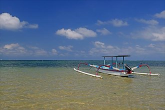 Traditional outrigger boat on the beach of Sanur