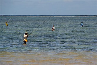 Anglers on the beach of Sanur