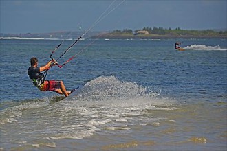 Kite surfers on the beach of Sanur
