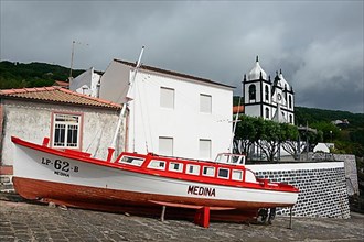 Boat and church at the harbour