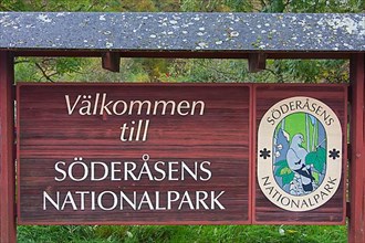 Welcome sign with logo at the entrance of Soederasen NP