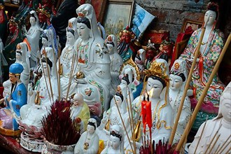 Worship figures with incense sticks