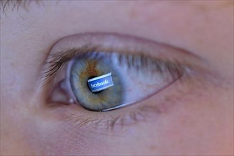 Eye with Facebook icon