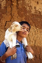 A boy with lamb