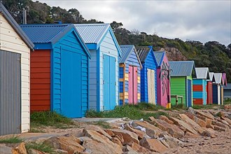 Colourful beach huts along Port Phillip Bay on the Mornington Peninsula south of Melbourne