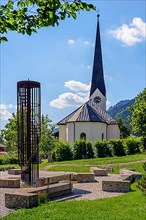 St. Anton's Parish Church in Balderschwang with fountain in the Balderschwang Valley