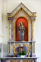 Side altar with figure of Mary