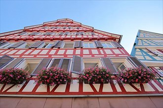 Decorative half-timbered house with view up to the sky at the market place in Calw