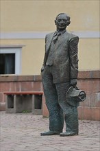Statue of Hermann Hesse on the Nikolausbruecke in Calw