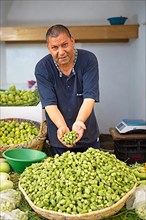 Moroccan man with okra