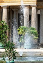 Fountain with water fountain at the Orangery Palace in Sanssouci Park