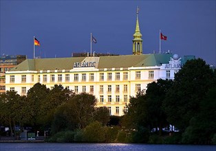 Hotel Atlantic Kempinski with outer Alster and steeple of St. Trinity Church