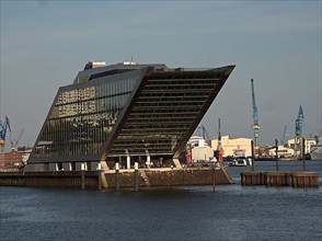 The Dockland is an office building on the Elbe whose architecture is based on a ship