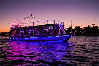 Illuminated excursion boat on the Nile near Aswan
