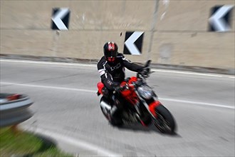 Wiping picture motorcyclist right turn