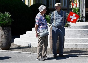 Senior Couple Swiss Flag