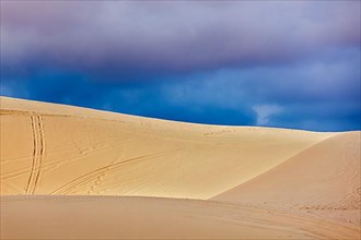 White sand dunes before storm