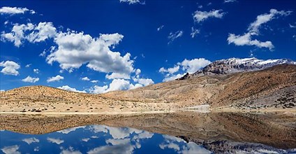 Mountain lake in Himalayas with reflection panorama. Dhankar