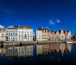 Travel Belgium medieval european city town background with canal. Koperlei street