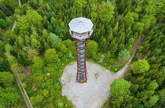 Aerial view of the Hohe Warte lookout tower surrounded by forest