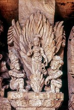 Sita midst of Agini or fire. 17th century wooden carvings in Meenakashi Sundareswarer temple's chariot at Madurai
