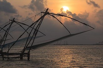 Kochi chinese fishnets on sunset. Fort Kochin